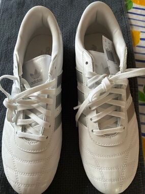 Tae kwon do sneakers White Sneakers with Gray Metallic Stripes. leather